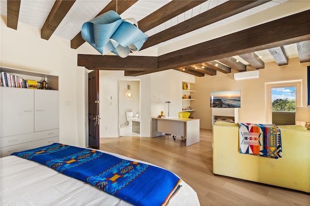 6 Overlook Rd, Santa Fe, NM 87505 - bedroom featuring wooden ceiling, ensuite bath, beamed ceiling, and wood finished floors