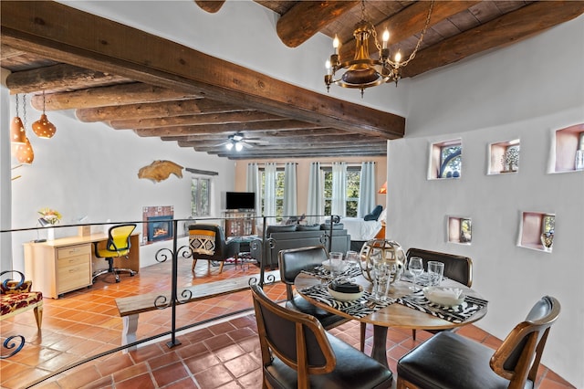 6 Overlook Rd, Santa Fe, NM 87505 - dining room featuring ceiling fan with notable chandelier, tile patterned floors, and beam ceiling