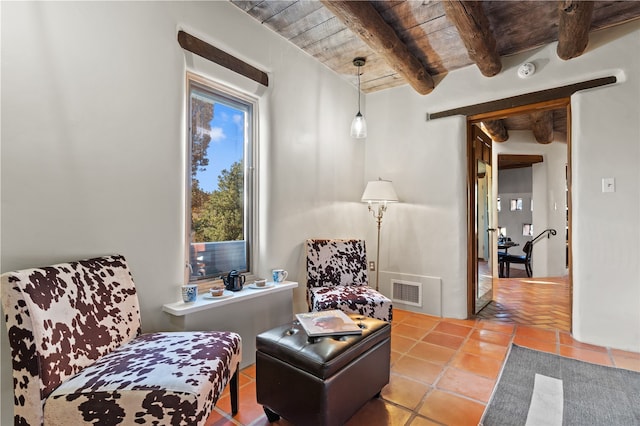 6 Overlook Rd, Santa Fe, NM 87505 - sitting room with tile patterned floors, beamed ceiling, visible vents, and wooden ceiling