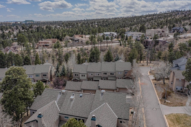birds eye view of property with a residential view