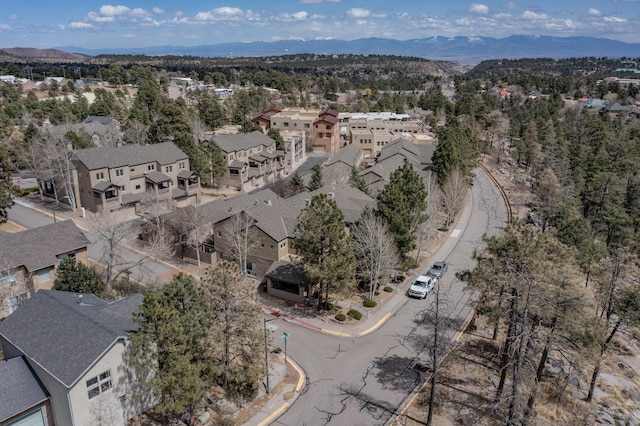 aerial view featuring a mountain view and a residential view