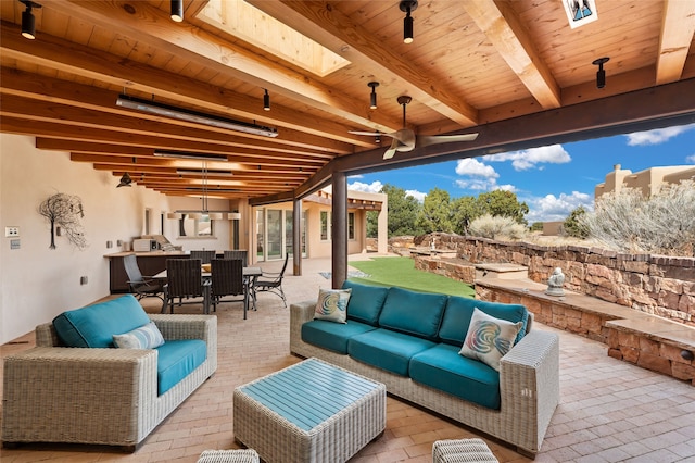 19 Via Pampa, Santa Fe, NM 87506 - view of patio / terrace with an outdoor living space and outdoor dining area