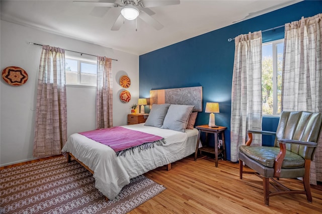 908 Rio Vista St, Santa Fe, NM 87501 - bedroom featuring wood finished floors and ceiling fan