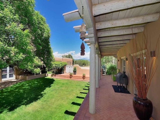 24 Paintbrush Cir, Santa Fe, NM 87506 - view of green lawn featuring a patio