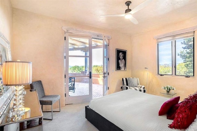 24 Paintbrush Cir, Santa Fe, NM 87506 - carpeted bedroom with access to exterior and ceiling fan