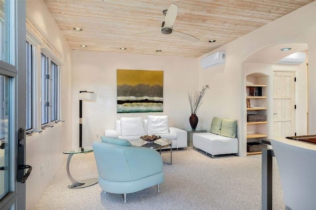 24 Paintbrush Cir, Santa Fe, NM 87506 - living room with wood ceiling, carpet floors, an AC wall unit, recessed lighting, and arched walkways