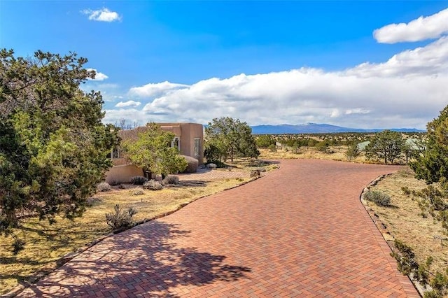 24 Paintbrush Cir, Santa Fe, NM 87506 - view of community with a mountain view