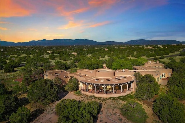 24 Paintbrush Cir, Santa Fe, NM 87506 - aerial view at dusk of a mountain view
