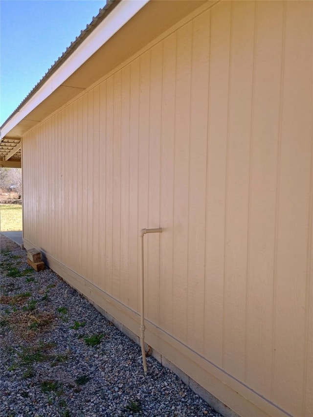 view of property exterior with metal roof