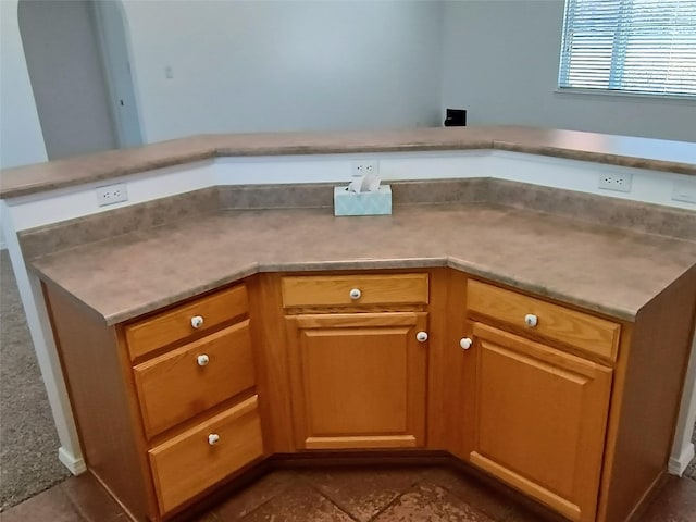 kitchen featuring light countertops