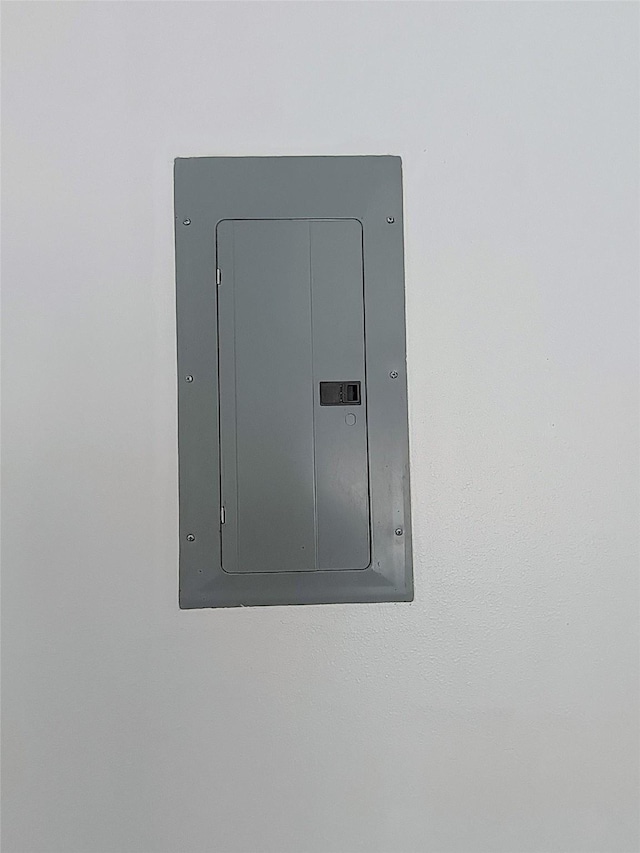 utility room featuring electric panel