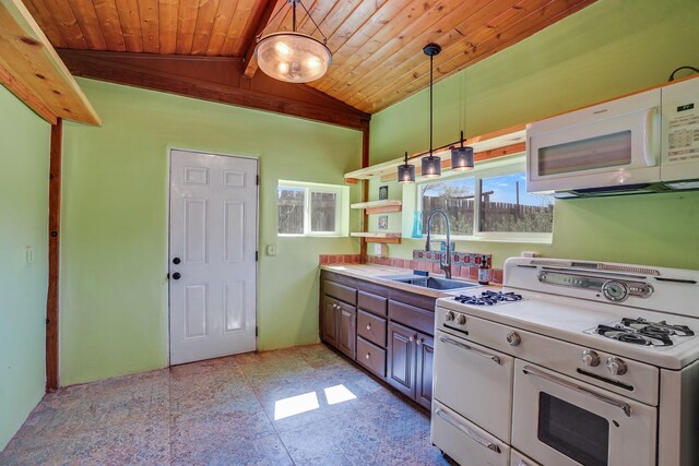 3112 Nm 14, Cerrillos, NM 87010 - kitchen featuring a sink, white appliances, light countertops, lofted ceiling, and wooden ceiling