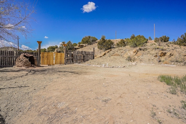 3112 Nm 14, Cerrillos, NM 87010 - view of yard featuring fence