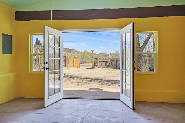 3112 Nm 14, Cerrillos, NM 87010 - doorway to outside with french doors, a wealth of natural light, and electric panel