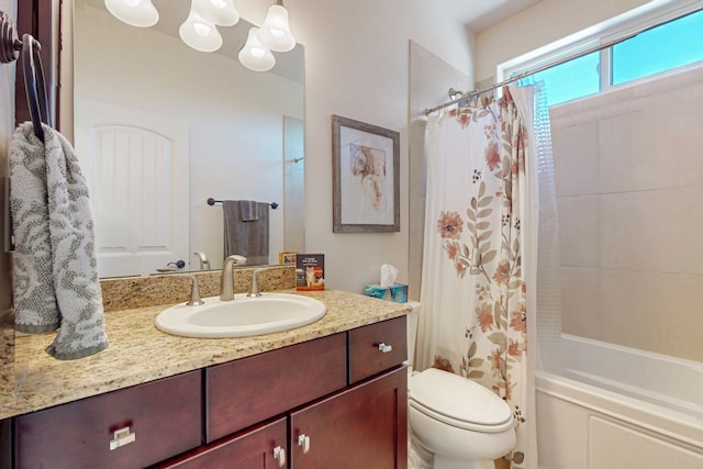 full bath featuring shower / bathtub combination with curtain, vanity, and toilet