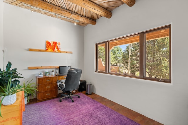 home office with beamed ceiling