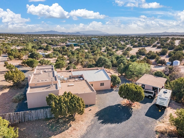 drone / aerial view featuring a mountain view