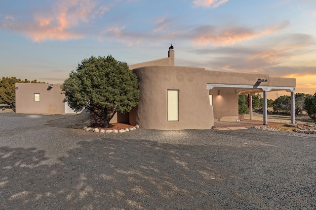 view of front facade with stucco siding