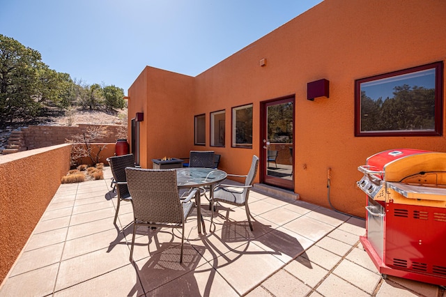 view of patio featuring outdoor dining area and area for grilling