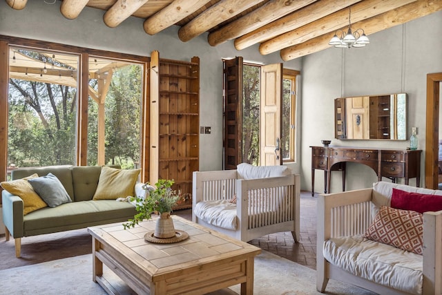 living area with beamed ceiling and carpet floors