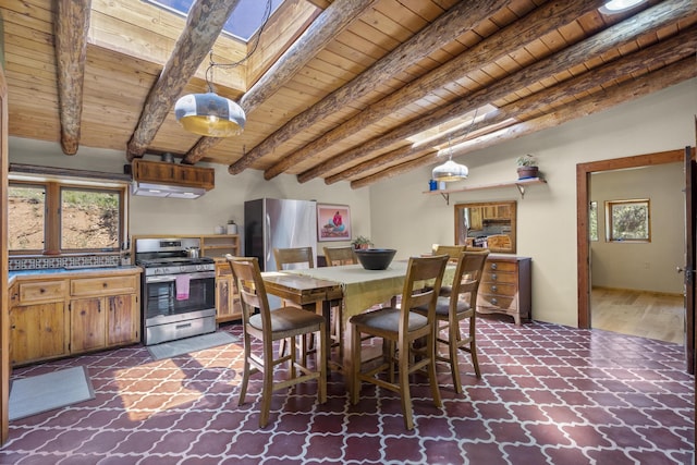 dining area featuring wooden ceiling, beam ceiling, and a skylight