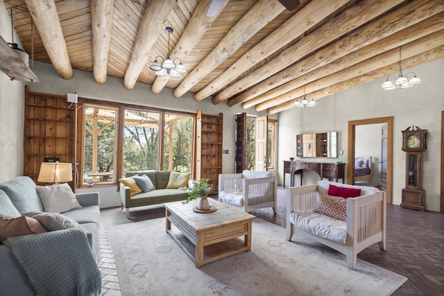 living area featuring a chandelier, beamed ceiling, and wooden ceiling