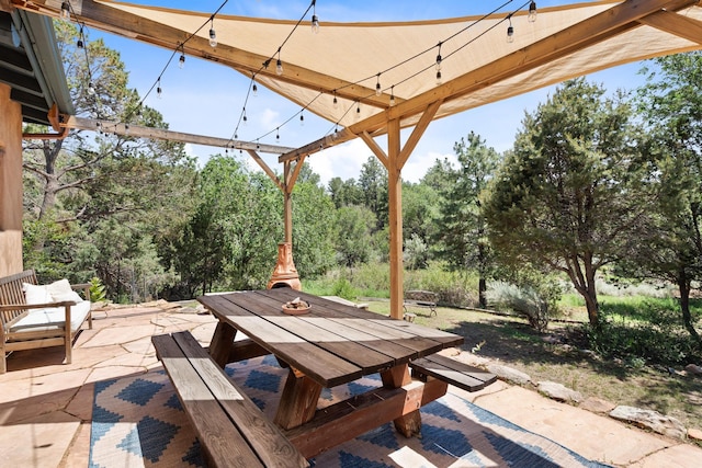 view of patio featuring outdoor dining area