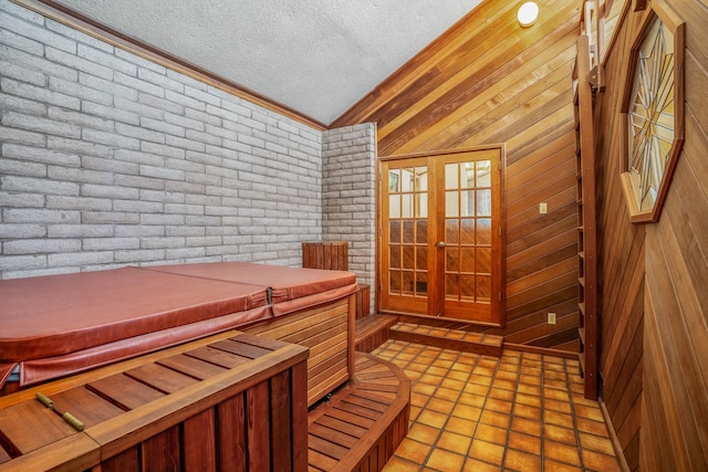 view of sauna / steam room with brick wall