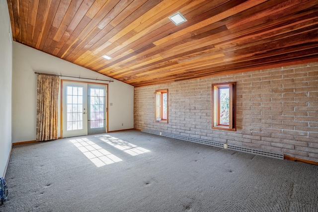 empty room with wooden ceiling, baseboards, and carpet