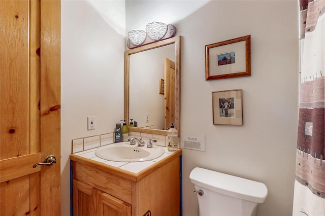 387 County Road B64, Pecos, NM 87552 - bathroom featuring toilet and vanity