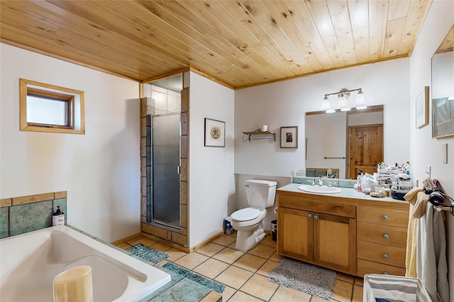 387 County Road B64, Pecos, NM 87552 - bathroom with tile patterned floors, a garden tub, a shower stall, toilet, and vanity
