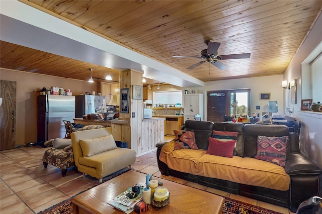 387 County Road B64, Pecos, NM 87552 - living area with wood ceiling, light tile patterned flooring, and a ceiling fan