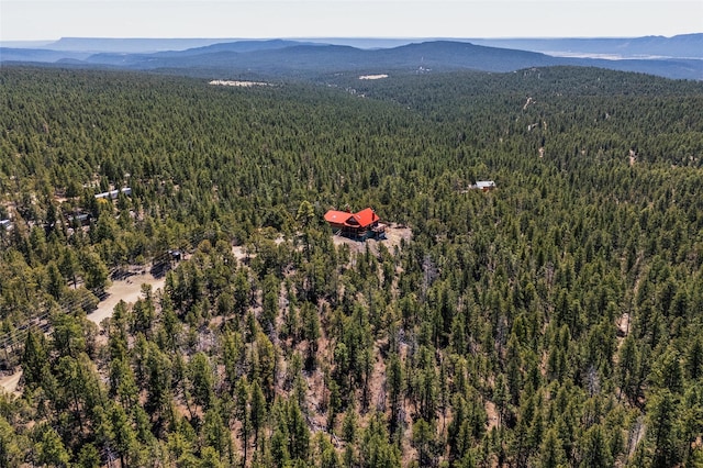 387 County Road B64, Pecos, NM 87552 - aerial view of property and surrounding area with a forest and a mountain backdrop