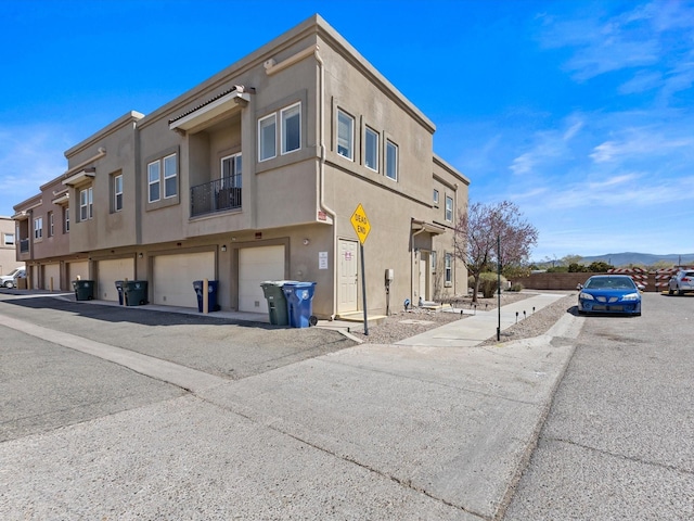 view of building exterior with a garage