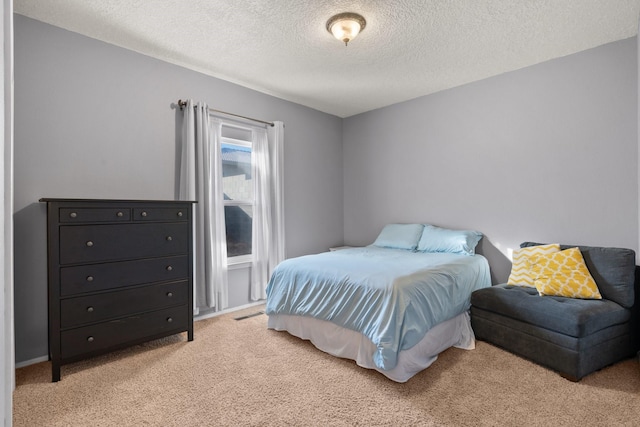 10335 Dunbar St NW, Albuquerque, NM 87114 - bedroom with light colored carpet and a textured ceiling