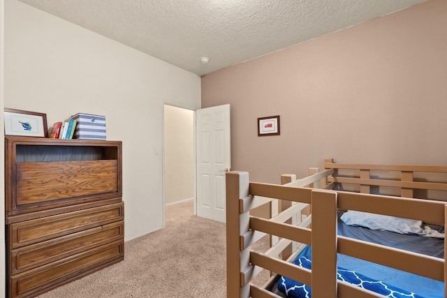 10335 Dunbar St NW, Albuquerque, NM 87114 - carpeted bedroom featuring a textured ceiling