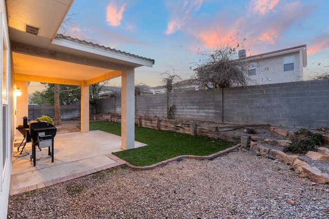 10335 Dunbar St NW, Albuquerque, NM 87114 - view of yard featuring visible vents, a fenced backyard, and a patio