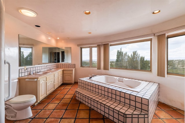 full bathroom with recessed lighting, a bath, tile patterned flooring, and vanity