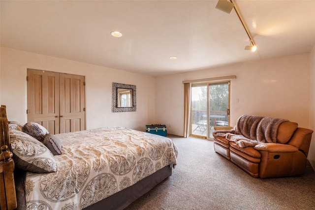 bedroom with access to outside and carpet