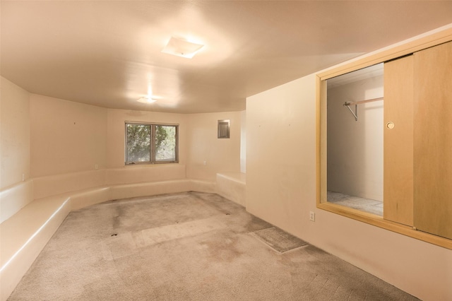 below grade area featuring carpet flooring