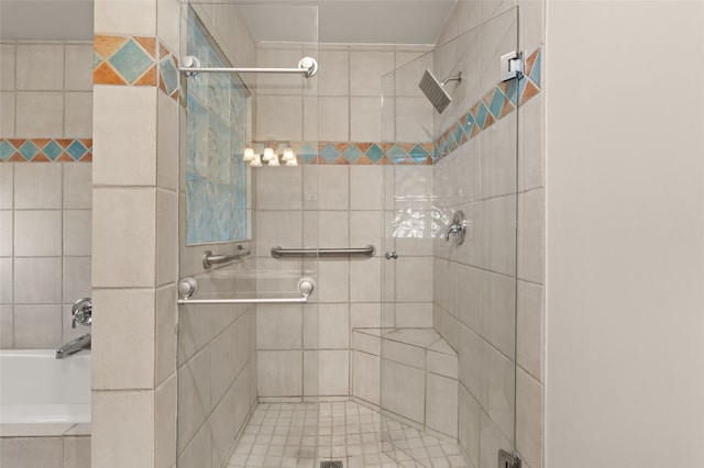 full bathroom with a shower stall