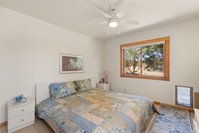bedroom with baseboards and ceiling fan