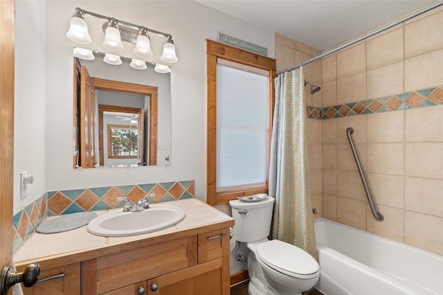 bathroom with shower / bath combination with curtain, toilet, decorative backsplash, and vanity