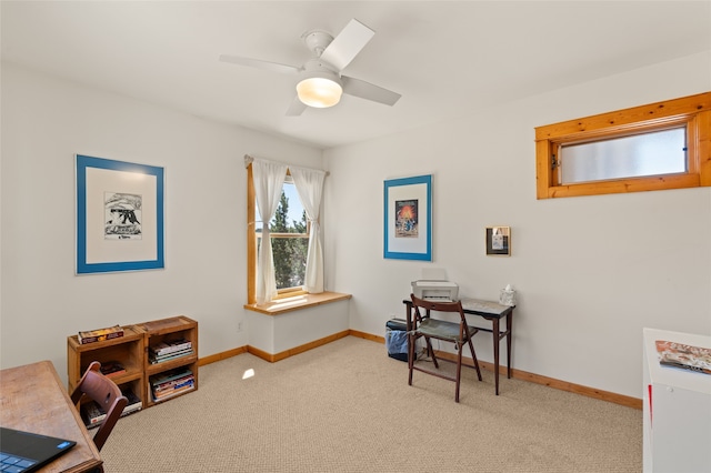 office featuring baseboards, carpet floors, and ceiling fan