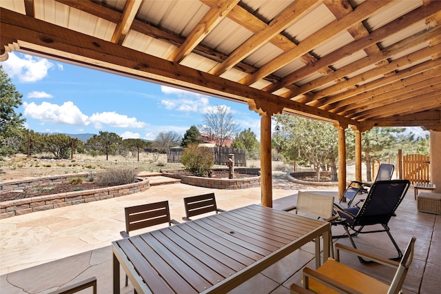 view of patio / terrace with fence and outdoor dining space