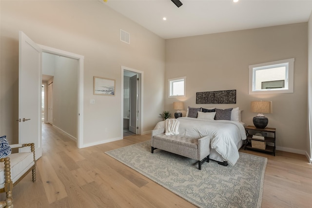 bedroom with recessed lighting, visible vents, light wood finished floors, and baseboards