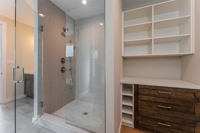full bath featuring tile patterned floors, recessed lighting, and a stall shower