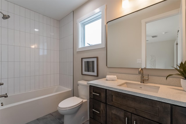 full bath featuring tile patterned floors, toilet, visible vents, shower / washtub combination, and vanity