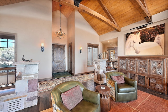 living area featuring an inviting chandelier, beamed ceiling, wood finished floors, wood ceiling, and high vaulted ceiling