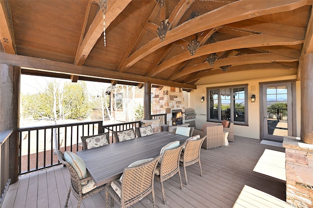deck with outdoor dining area